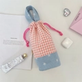 Detail of drawstring plaid water bottle bag with pink gingham and denim patchwork - Blush Pink Plaid