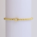 Gold beaded elastic bracelet featuring a cubic letter T pendant with zircon inlays - Letter T