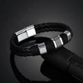 Men's black braided leather bracelet with silver magnetic metal clasp and textured rings - Black