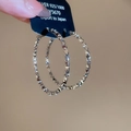 Detail view of S925 sterling silver hoop earrings with a textured geometric cut surface - 46# 3D Cut Surface Shining Silver Large Hoop - 5cm