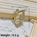 Golden butterfly brooch with rhinestones and white cat eye stone in 3.7x5.7cm size - Gold Butterfly Cat Eye