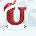 Glittery red Christmas letter U ornament with Santa hat and customizable white banner - Letter U