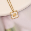 Detailed close-up of a golden square rose pendant necklace with beaded edges - Gold Square Rose Flower Style (6#)
