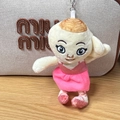Plush shark doll keychain accessory with blue eyes and pink dress on a metal ball chain - Miss Coffee