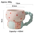 Tazza in ceramica rosa e menta con stelle e manico unico con perline blu - Perline Stella