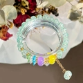 Exquisite pearl and sea blue beaded bracelet with gold accents on a reflective surface - S069-explosive Green Pendant Bead Bracelet #sz555