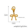 Golden stainless steel bow charm pendant with textured bead surface and lobster clasp - Gold Bow Pendant (D155)