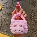 Handmade pink knitted Sanrio-style bunny pouch with beaded handle and cute plush face - Pink Rabbit Knitted Coin Purse