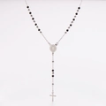 Detailed view of silver beaded rosary necklace with cross and saint medallion pendant - Two-tone Black