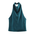 Macro shot of dark green satin halter top showing draped neckline and silky fabric texture - S / Malachite green