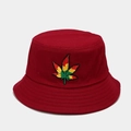 Detail view of red canvas bucket hat with gradient leaf embroidery and reinforced brim - Burgundy