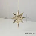 Golden iron Christmas star ornament with hollow geometric pattern and 15.5cm diameter - Gold Eight-Pointed Star