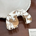 Elegant marble pattern hair claw clip in coffee tones on a dark wood background - Oval Claw Clip-8.8cm
