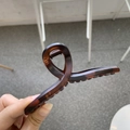 Close-up of tortoise shell pattern 11cm hair claw clip with glossy acrylic finish - 11cm / Matte Red Brown