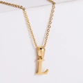 Detailed macro shot of 18k gold plated stainless steel letter L pendant necklace - Letter L
