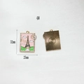 Detail of Eiffel Tower stamp pendant showing size measurements and golden textured back - 4# Tower Stamp