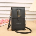 Close-up of black leather crossbody phone bag with three zippers and gold hardware detail - Black