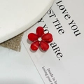 Floral mini hair claw clip in translucent red with a sparkling center rhinestone - Red Flower