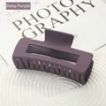 Matte deep purple square hair claw clip for thick hair displayed on a styling tray - Dark Purple