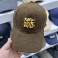 Dark brown cotton baseball cap featuring yellow Keep Your Smile embroidery detail - M / Coffee