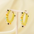 Detail of yellow hoop earrings with colorful beads and resin slices on a silk background - Lemon Yellow Multi-color Beaded Style (KE104914-K)