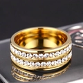 Detail of a wide gold titanium ring featuring double-row sparkling crystal pavé settings - US 6 / Gold