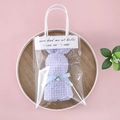 Detail of purple bunny-shaped coral fleece towel in transparent PVC gift bag - ins Gift Bag + Blue Rabbit