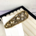 Pasador de gota con cristales color champán dorado en tarjeta blanca - Nuevo Estilo Gota de Agua