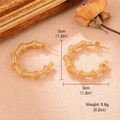 Boucles d'oreilles en acier doré torsadées en forme de U de 3cm avec finition brillante - Style Circulaire Enveloppé (WGXA004506503)