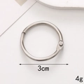 Detail shot of 3cm silver metal spring ring buckle with weight and size indicators - Jump Rings / 30MM / Silver