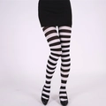 Classic black and white striped stockings worn with black high heels for holiday parties - One Size / Black and White Striped Tights