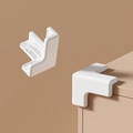 Paraspigoli a L in silicone bianco per sicurezza bambini con retro adesivo verde - Forma a T Bianco Puro