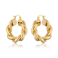 Retro oversized twisted gold hoop earrings with mirror reflection on white background - Gold