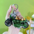 Detailed miniature green pull-back motorcycle toy keychain with colorful graffiti style - Motorcycle Keychain - Green