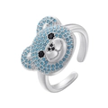Makroaufnahme von 18K vergoldetem Teddybär-Ring mit blauem Zirkonia und offenem Ringband - Silber mit seeblauem Zirkonia