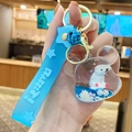 Portachiavi orso polare azzurro con sabbie mobili e cinturino Rabbit in mano - Orso Polare Blu sott'Olio - Testa di Orso