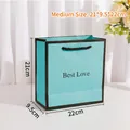 Medium size Tiffany blue gift bag with black handles and Best Love text, 21x9.5x22cm - Medium / Light Blue