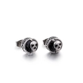 Punk style stainless steel stud earrings with black stone and silver skull relief detail - Black Zirconia (KE71215)