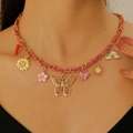 Colorful woven necklace with butterfly and starfish pendants on gold chain and pink cord - KC Gold (8412)