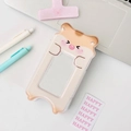 Cute hamster shaped acrylic card holder for photo storage on a clean desk - Hamster
