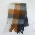 Folded brown and gray checkered mohair scarf with tassels on white background - Style 42 Blue Fruits