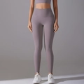 Detailed front view of high-waisted seamless purple yoga leggings with a nude-feel finish - Mulberry Purple