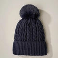 Navy blue cable-knit beanie with faux fur pompom for winter warmth and casual style - Navy Blue
