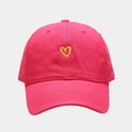 Close-up of pink cotton baseball cap featuring yellow heart embroidery and twill texture - Adjustable / Rose Red