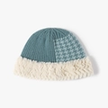 Cappello da pescatore in maglia verde petrolio con bordo in pelliccia sintetica e pied-de-poule - Verde