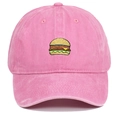 Close-up of pink washed cotton baseball cap with embroidered burger motif and vintage texture - Adjustable / Pink