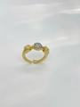 Golden geometric open ring featuring a circular pave-set rhinestone centerpiece - Ring-Two Tone