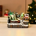 Illuminated Christmas music box featuring a rotating red train and snowy mountain village - Christmas Tree