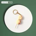 Portachiavi con polpa di capasanta realistica e anello dorato, ciondolo borsa 5cm - Spiedino di carne di capasanta