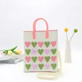 Gestrickte Tragetasche mit bunten Herzmustern und rosa Griffen in Cremeweiß - Herz Handytasche-Beige Rosa Grün